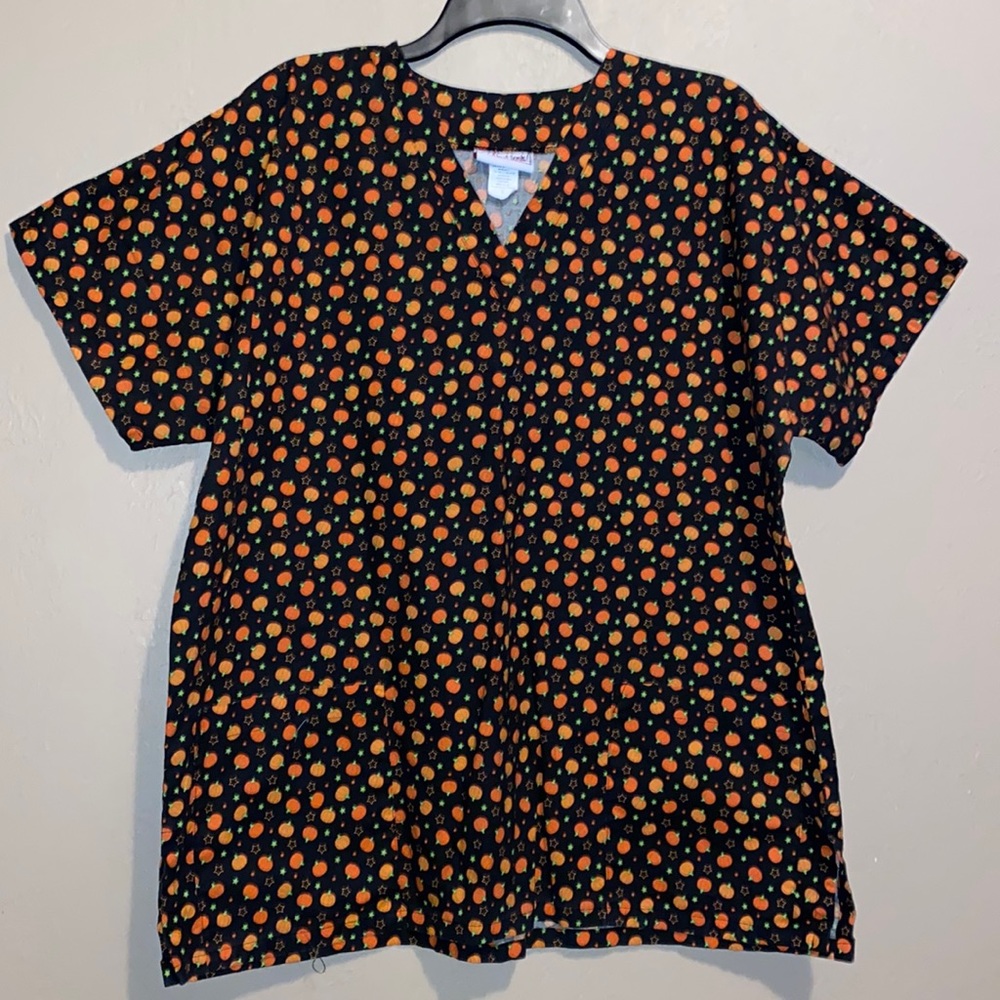 Large unisex fit. Pumpkin scrub top.